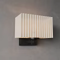 Modern White Pleated Wall Lamp with Black Base Mounted on Gray Wall