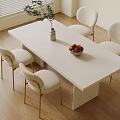 Modern Dining Room Interior With White Table Golden Leg Chairs Vase And Fruit Bowl