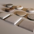 Various Shaped Upholstered Cushions In Neutral Tones With Woven Checkered And Smooth Textures