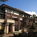 Modern Townhouse Exterior Design Featuring Brick Stone Facade Front Porch And Large Windows
