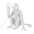 Monkey Shaped White Table Lamp in Sitting Pose Holding Bulb and Cord