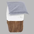 Rustic Wooden Stool With White Seat And Gray Cloth On Top