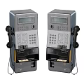 Silver Metallic Public Payphones With Display Screens Keypads Handsets And Coin Slots