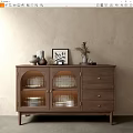 Modern Wooden Sideboard With Glass Doors Plates Inside Drawers And Decorative Items On Top