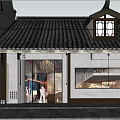 Traditional Chinese Storefront In Evening Featuring Wooden Panels Large Glass Windows And Eaves