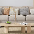 Modern Living Room Interior With Beige Sofa Round Ottoman Wooden Shelf And Potted Plants