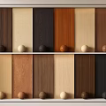 Various Wood Texture Wall Panels With Color Samples And Decorative Knobs