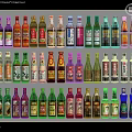 Various Colorful Condiment Bottles With Different Seasoning Labels In Kitchen