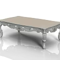 Ornate White Coffee Table With Intricate Carved Legs And Smooth Top