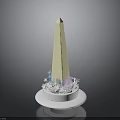 Tall Beige Obelisk Structure With Blue And Pink Decorative Elements On White Circular Base