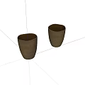 Two Elegant Beige Tea Cups With Textured Surface And Dark Interior On White Background