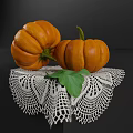 Fresh Orange Pumpkins Placed on White Lace Tablecloth with Green Leaf 3d model
