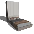 Modern Bedroom Interior With Beige Wardrobe And White Bed Frame With Pillows And Blanket
