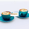 Teal cups with latte art holding coffee on saucers against light background