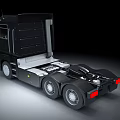 Black Modern Functional Truck Tractor With Sleek Cab And Wheels Design