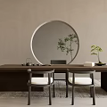 Wooden Tea Table With Comfortable Chairs White Cushions Round Mirror And Green Plants