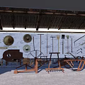 Traditional Farm Tools Display in Garden Landscape With Thatched Roof and White Brick Wall