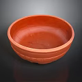 Intricate Hand Sculpted Orange Clay Bowl With Artisanal Textured Surface Design