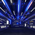 Futuristic CITY WEEKLY Event Venue Interior With Blue Lighting And Large Screens