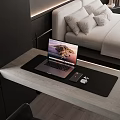 Modern Laptop On Wooden Desk With Mouse And Mouse Pad In Bedroom