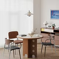 Modern Round Dining Table Set With Three Wooden Chairs Books Vase And Pendant Light
