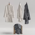 Hanging Robes in White Light Gray Dark Gray and Folded on Wooden Stool