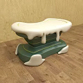 Unique Design Stool With Green Base White Top And Dripping Details On Wooden Floor