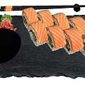 Fresh Salmon Sushi Rolls With Wasabi Ginger Soy Sauce On Black Stone Plate And Chopsticks