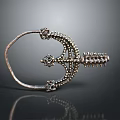 Silver Ornate Accessory With Intricate Design And Detailed Craftsmanship For Fashion Clothing
