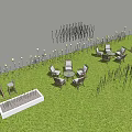 Outdoor Lights Illuminate Garden Lawn With Tables Chairs Ground And Pole Lights At Night