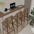Wooden Bar Counter With Laptop Headphones Books Potted Plants Rattan Chairs And Window