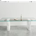 Glass Top Dining Table With Stone Legs Featuring Magazine And Minimalist Interior Decor