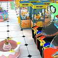 Colorful Entertainment Appliances In Indoor Game Area Featuring Prize Claw And Arcade Machines
