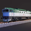 Green and White Model Train on Railway Tracks with Round Windows and Locomotive Design