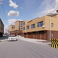 Commercial Street With Yellow Brown Buildings Cars On Road And Blue Sky White Clouds