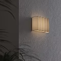 Modern Minimalist Wall Lamp With Fabric Shade On Textured Wall And Soft Lighting