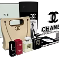 Chanel Bag And Box Collection With CC Logo Perfume Bottles And Coco Chanel Poster