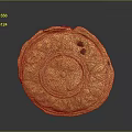 Golden Circular Carved Artifact With Intricate Floral Patterns And Decorative Design