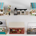 Various Charming Garden Ornaments With Small Stalls Display Shelves And Potted Plants