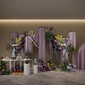 Elegant Floral Display With Purple Yellow Flowers Hanging Decorations Letter Ornaments And Dessert Table