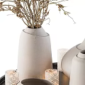 White Ceramic Vases With Dried Plants And Patterned Candles On Black Tray For Home Decor