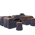 Multiple Comfortable Massage Beds With Matching Stools And Soft Fabric Covers
