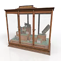 Wooden Display Cabinet With Glass Doors Showcasing Antique Sculptures Tools And Artifacts Inside