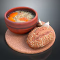 Hearty Soup With Carrots Noodles And Sesame Bread On Cork Mat With Garlic