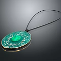 Green Oval Pendant with Central Gemstone and Intricate Pattern on Black Cord
