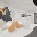 Smart Radio TV Exhibition Center Lounge Area with White Orange Egg Chairs and Map Decor