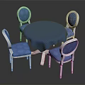 Round Blue Tabletop Dining Table Set with White Legs and Blue Cushioned Chairs