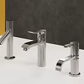 Three Silver Faucets on White Countertop with Gray and Yellow Walls