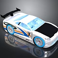 White Toy Race Car With Blue Orange Stripes Black Spoiler And Blue Wheels