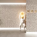 Modern Textured Veined Stone Wall Decor with Astronaut Holding Golden Sphere